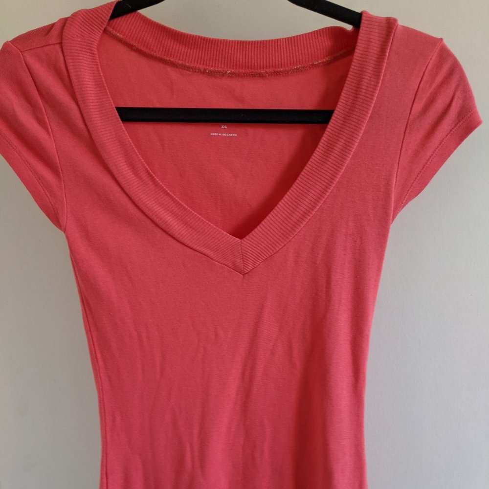 2 bright summer colored v-neck shirts